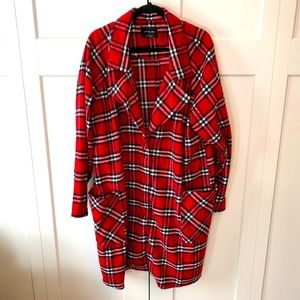 Woman’s long plaid jacket